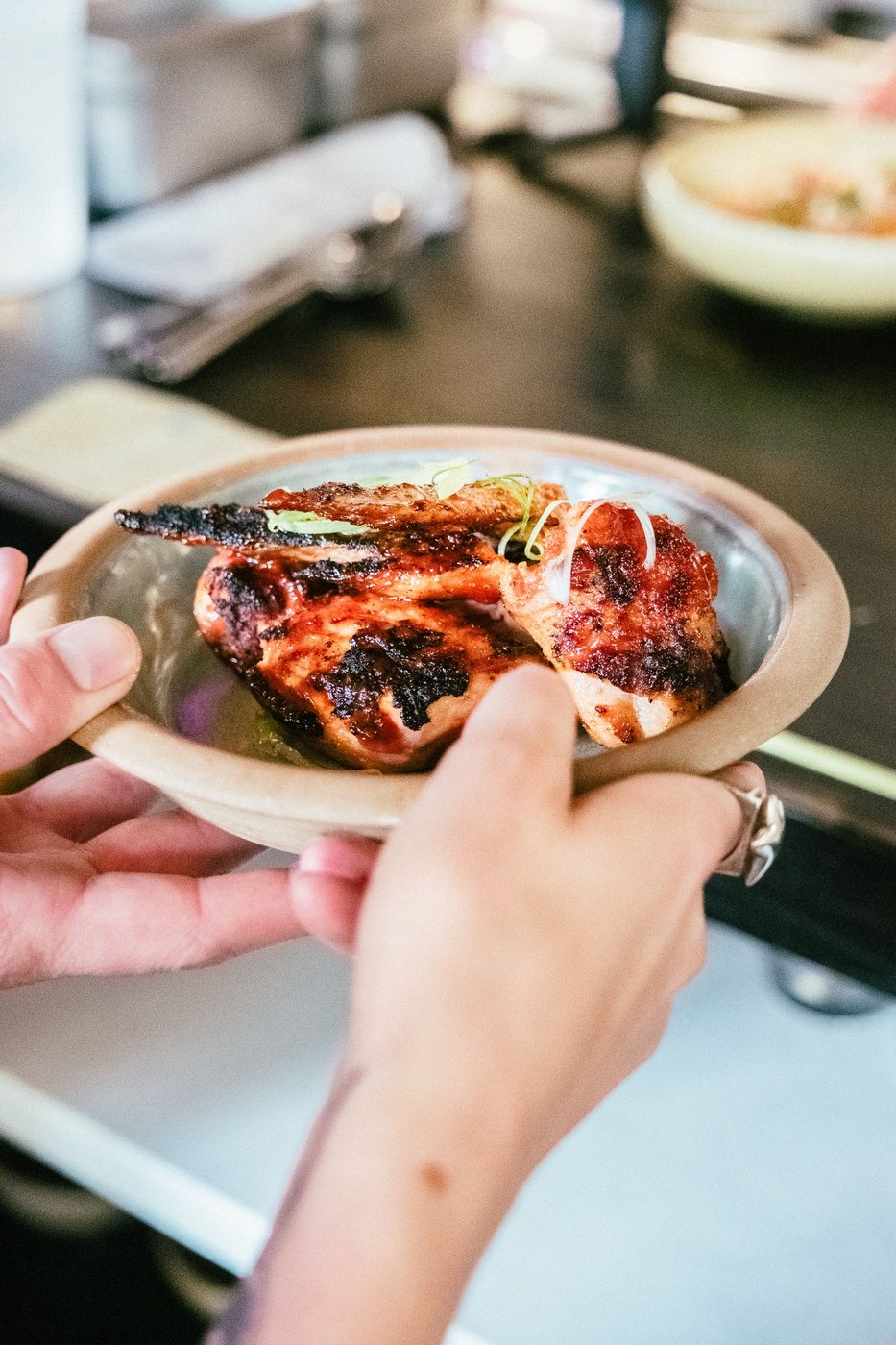 Plated grilled chicken entrée